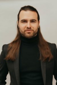 Headshot of Alex Halliday